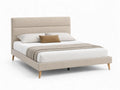 Letto matrimoniale imbottito con gambe in legno